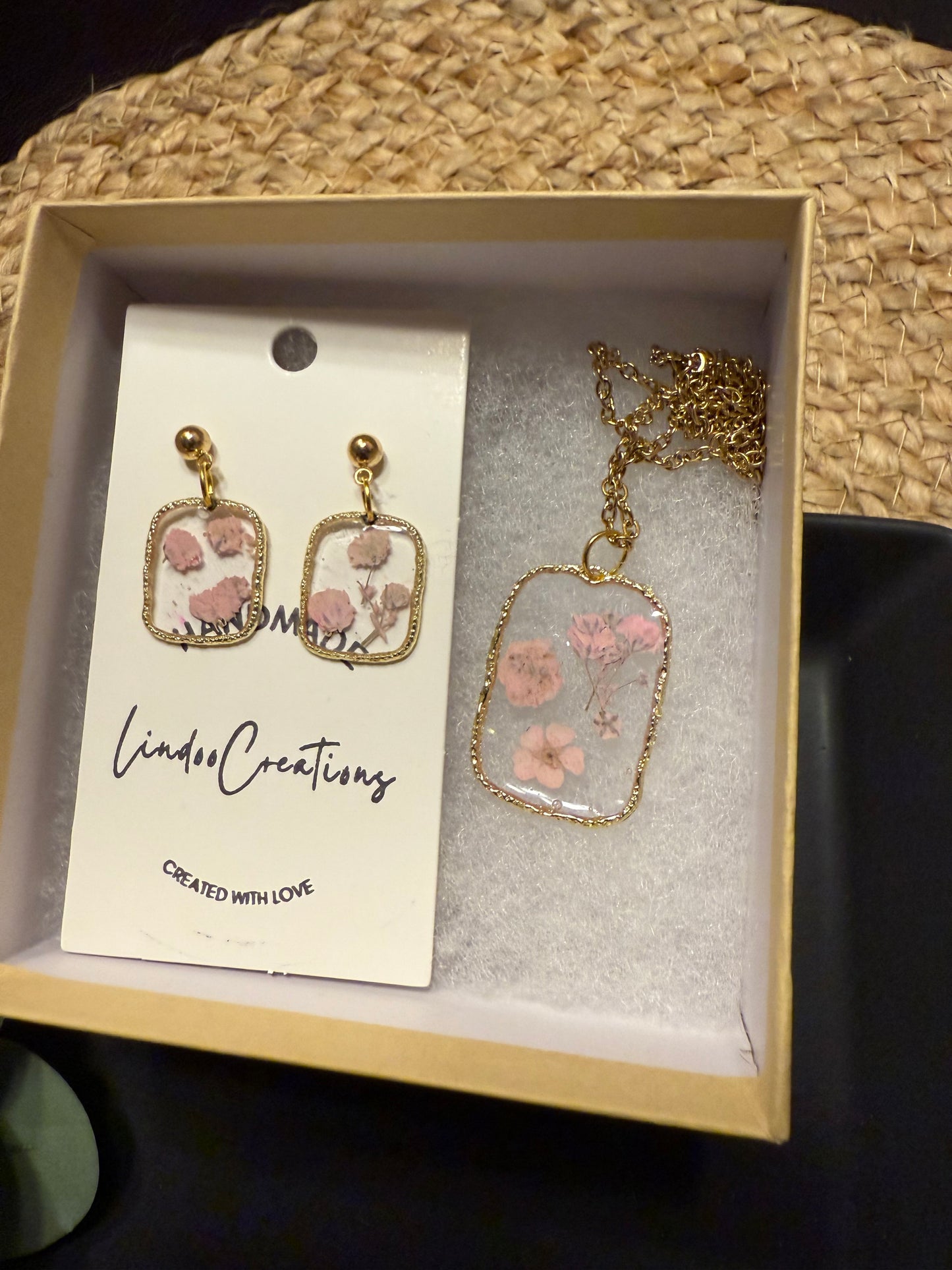 Delicate pink flowers in resin necklace and earrings set