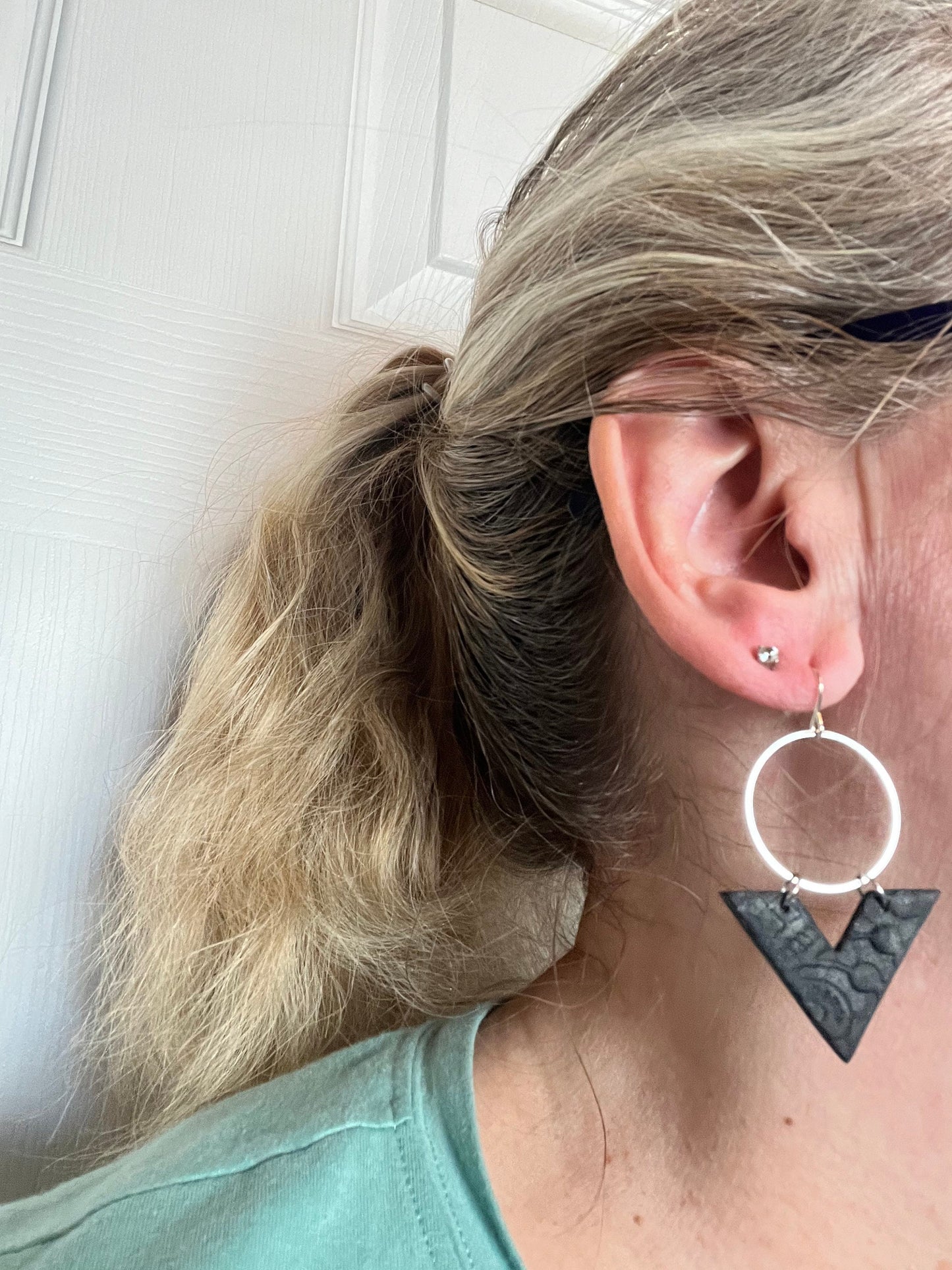 Ebony Black lightweight textured clay earrings handmade modern angle silver circle The Arrow
