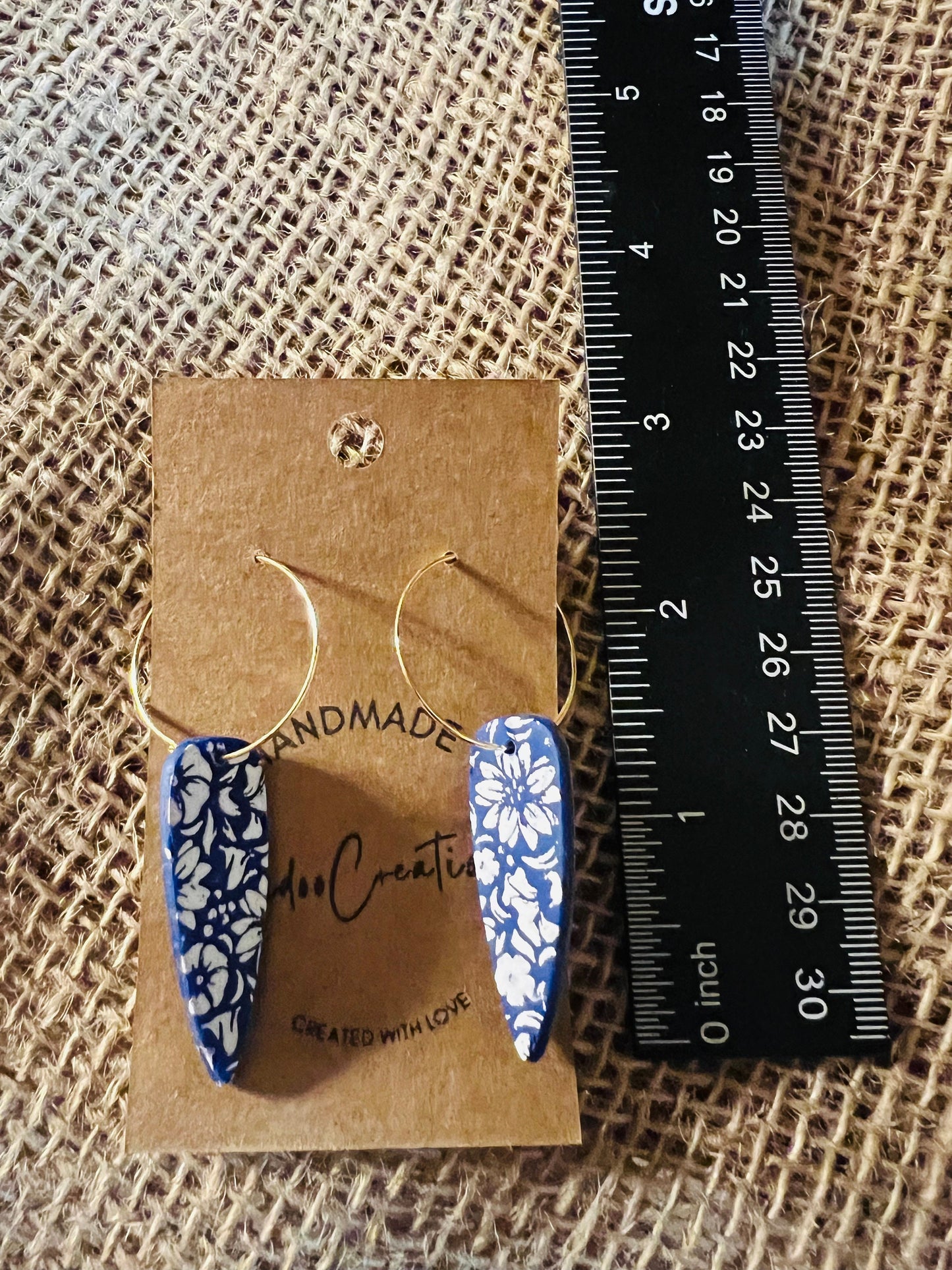 Royal Blue and white flowers dangling painted clay earring handmade lightweight floral The Dagger