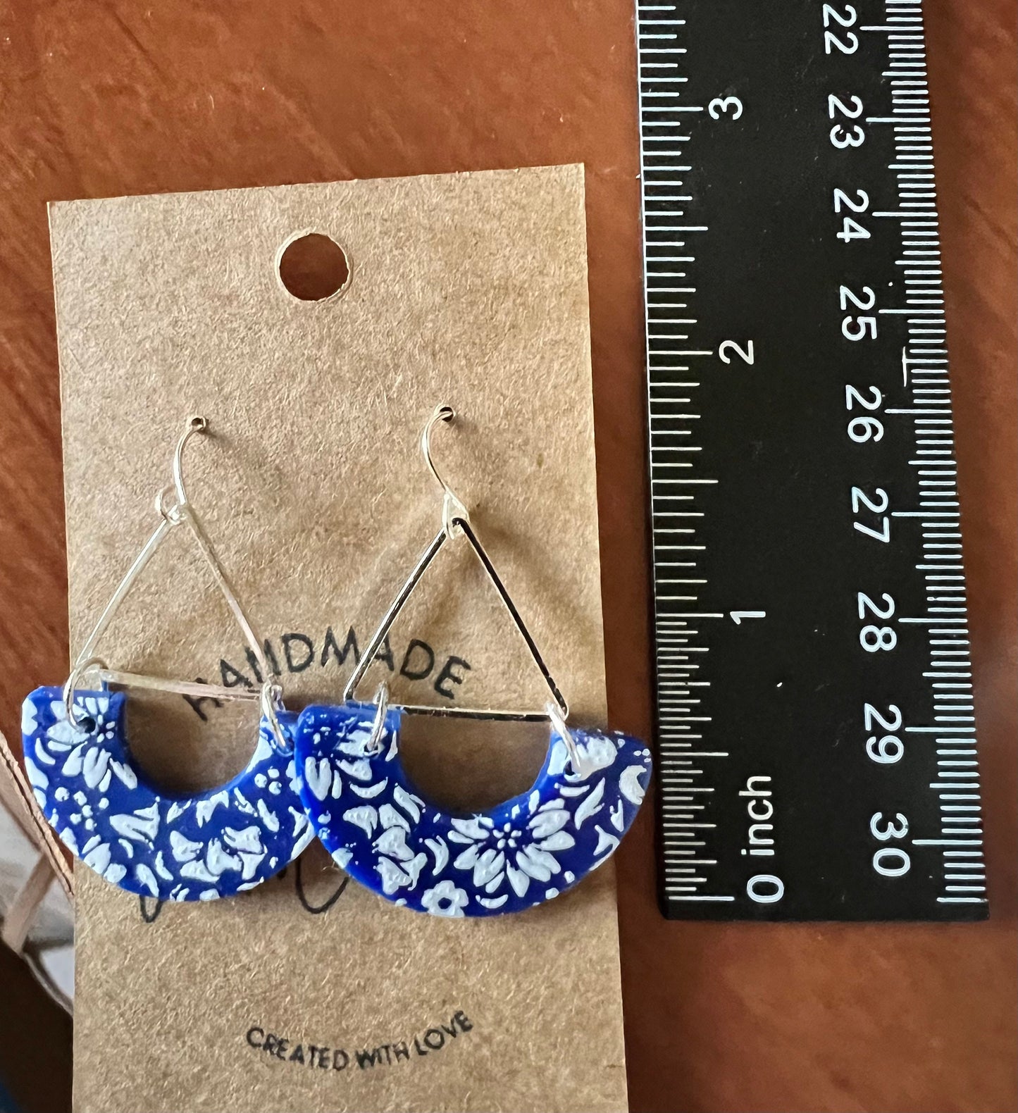 Royal Blue and white floral arch dangling lightweight clay earrings dark blue silver triangle The Wendy