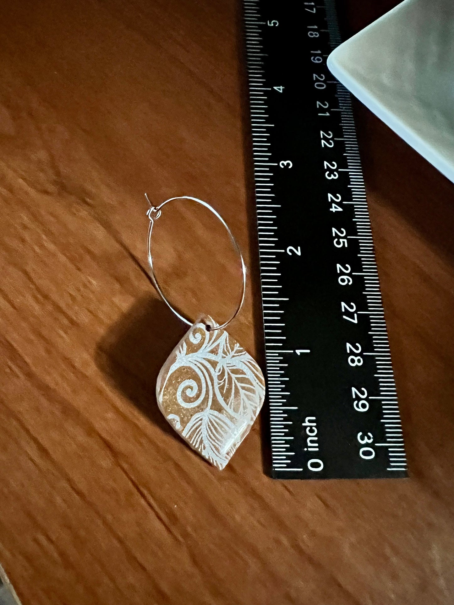 Brown tan silver dangling painted clay earrings handmade lightweight shiny resin coating ear wire closure The Claire
