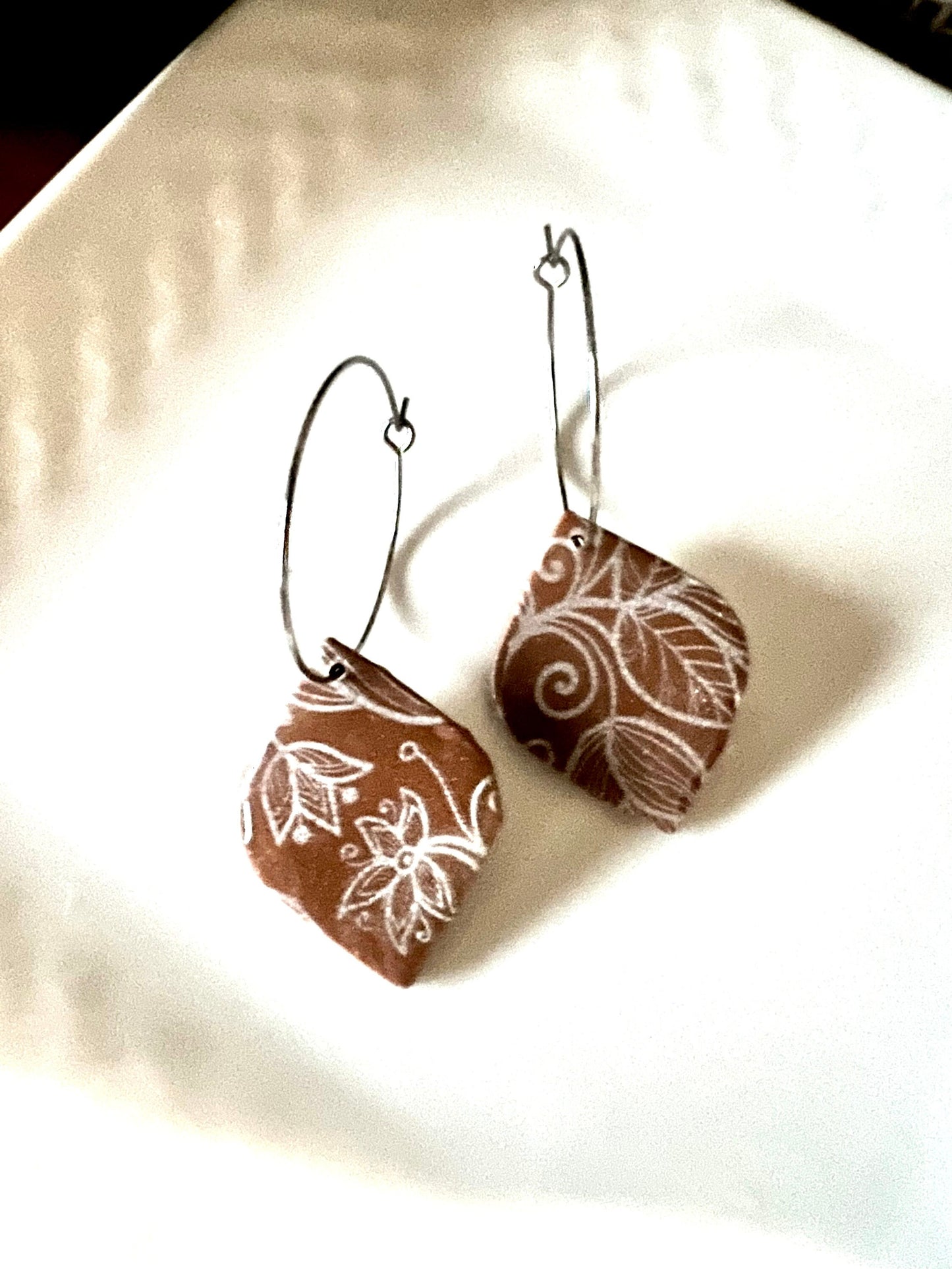 Brown tan silver dangling painted clay earrings handmade lightweight shiny resin coating ear wire closure The Claire
