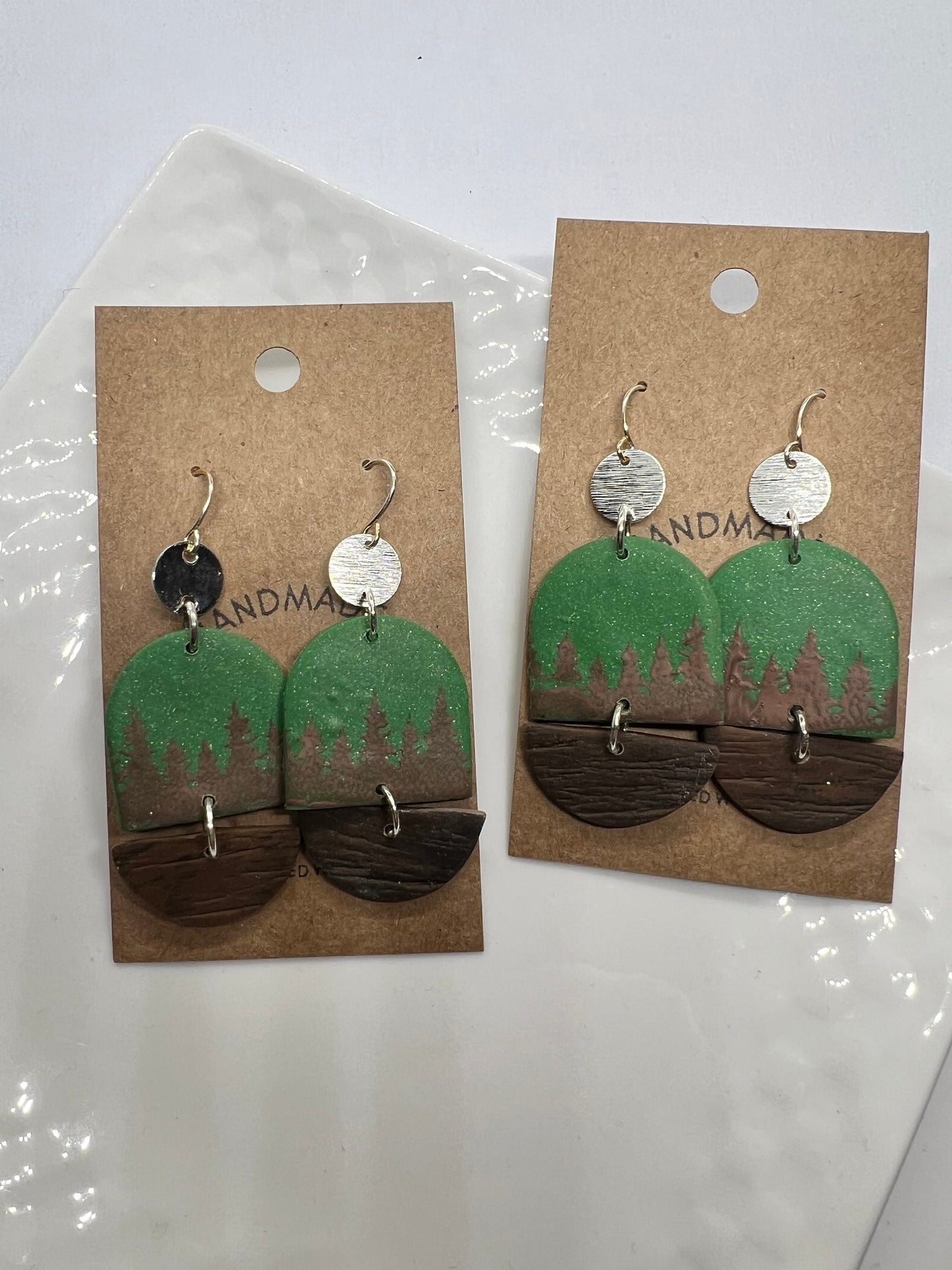 Green and brown pine trees and faux wood disks clay earrings silver accents lightweight The Ashley