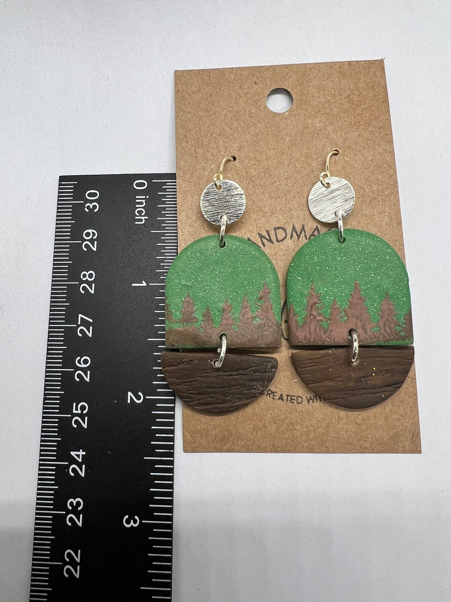 Green and brown pine trees and faux wood disks clay earrings silver accents lightweight The Ashley