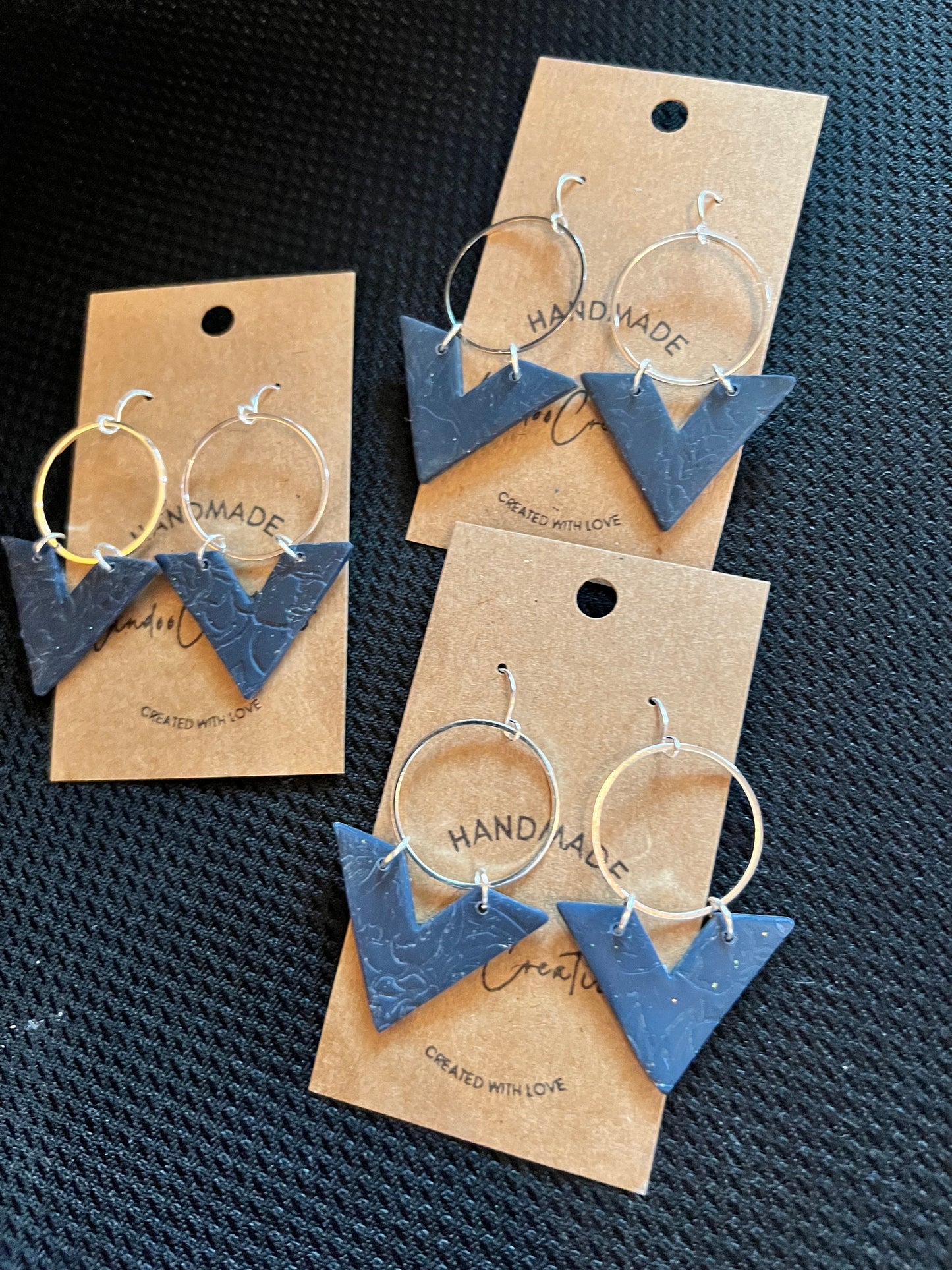 Navy Blue lightweight textured handmade clay earrings modern angle with silver circle The Arrow