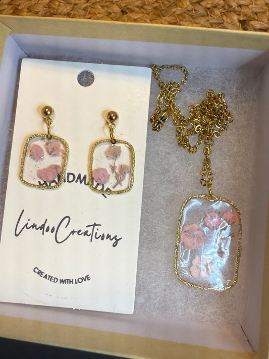 Delicate pink flowers in resin necklace and earrings set
