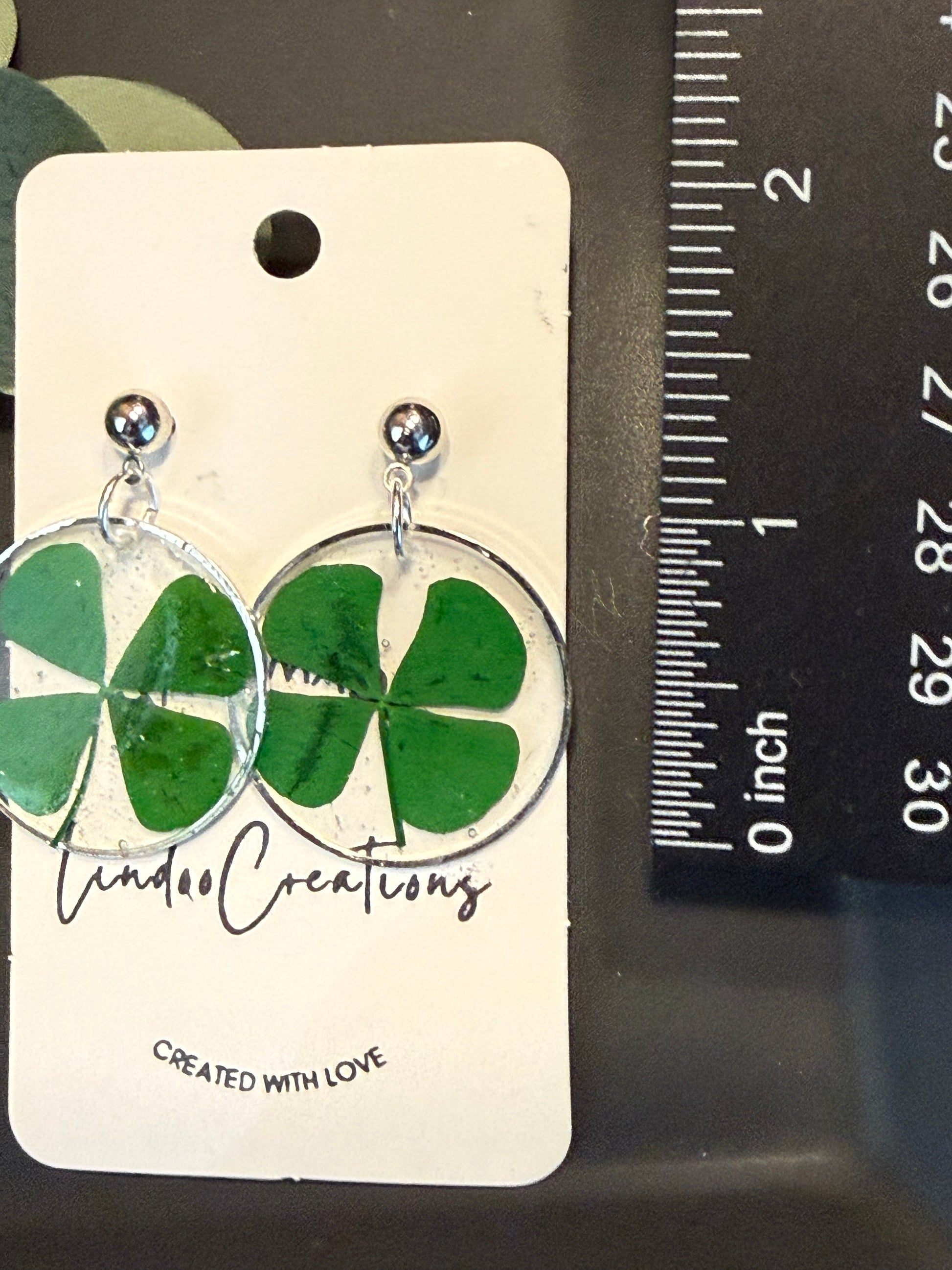 Green four leaf clover shamrock lucky Irish earrings in resin St Patricks day lightweight floral leaf handmade earrings gold or silver circle and stud pushback closure 1 inch long