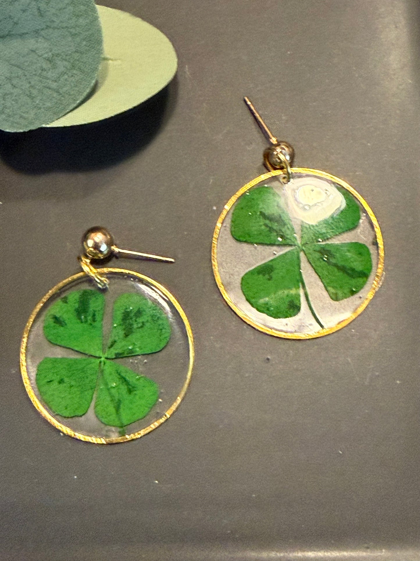 Green four leaf clover shamrock lucky Irish earrings in resin St Patricks day lightweight floral leaf handmade earrings gold or silver circle and stud pushback closure 1 inch long