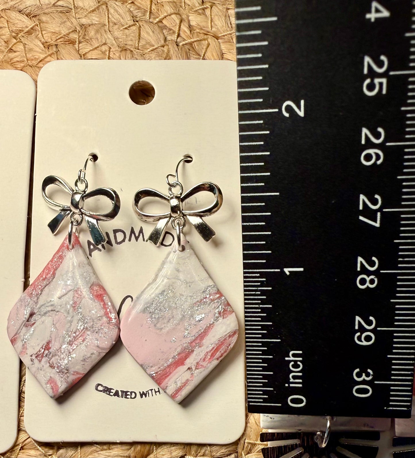 Pink marble bold Clay Dangle Earrings: Silver Bow Accents,  Handmade Statement Jewelry
