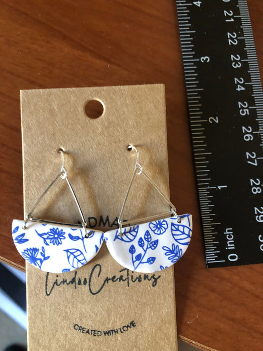 Blue and white Floral dangling clay earrings modern disc shape Silver hardware handmade lightweightThe Katie